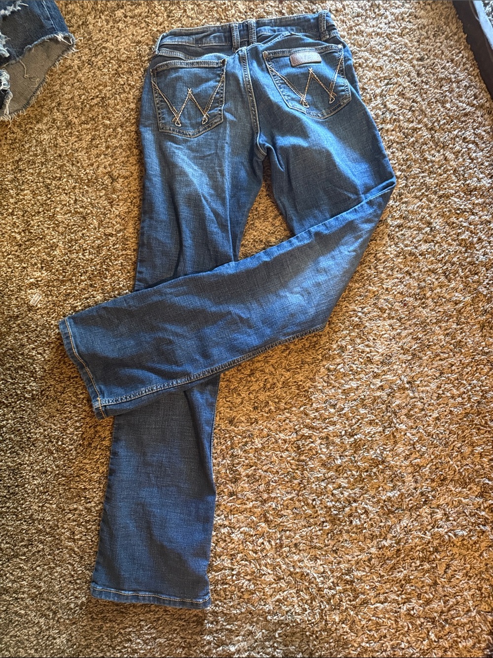 Women's Blue Boot Cut Jeans with Decorative Back Stitching